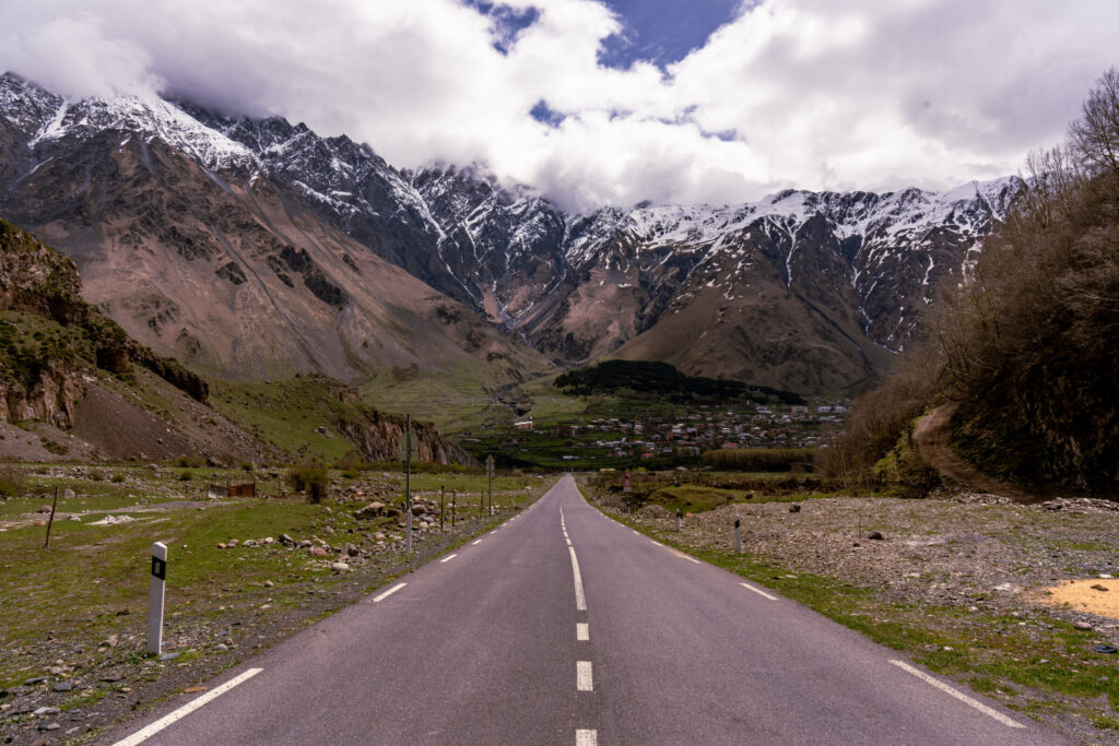 Caucasus road snowy peaks